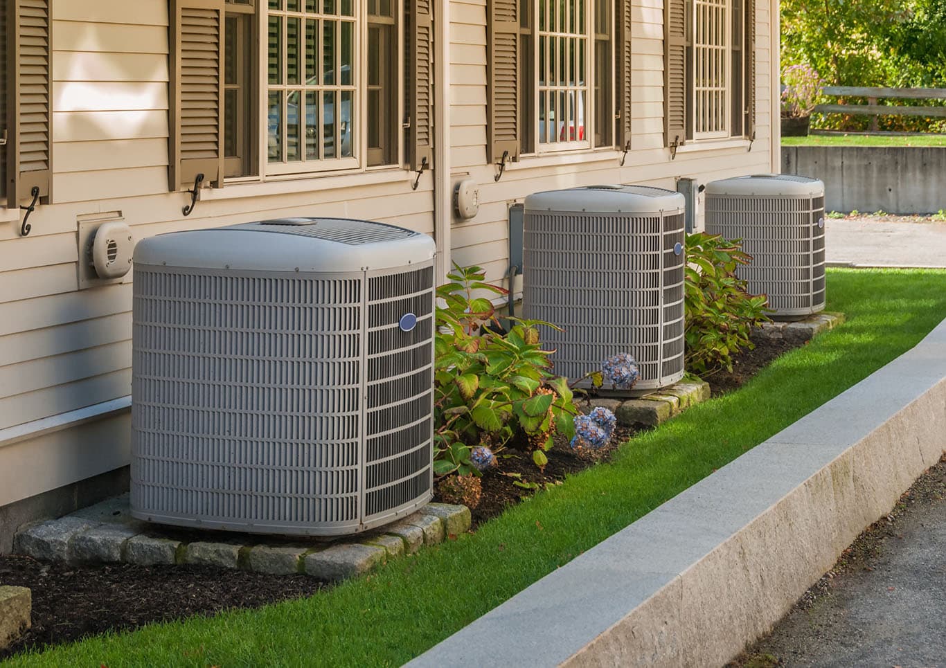 Heat pumps next to homes in Rhode Island