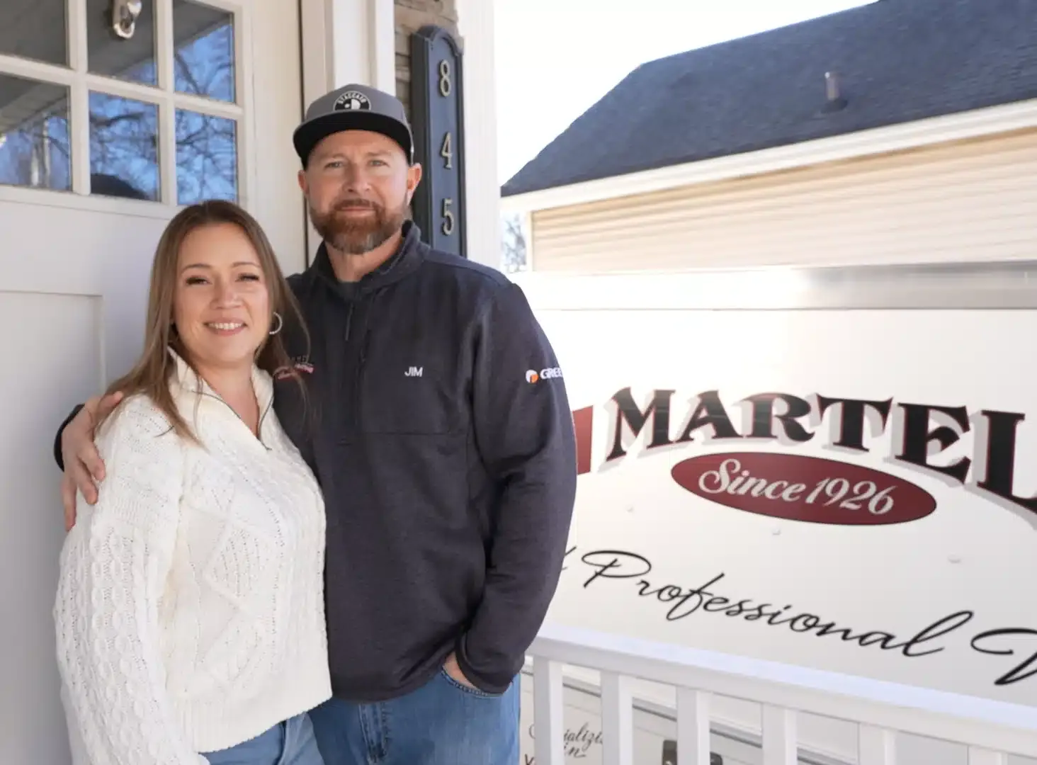 couple in front of martel service truck