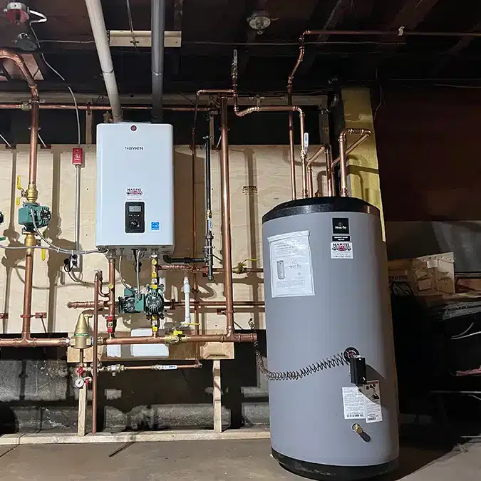 Navien wall-hung combination boiler and indirect water heater with copper piping, installed by Martel in Rhode Island