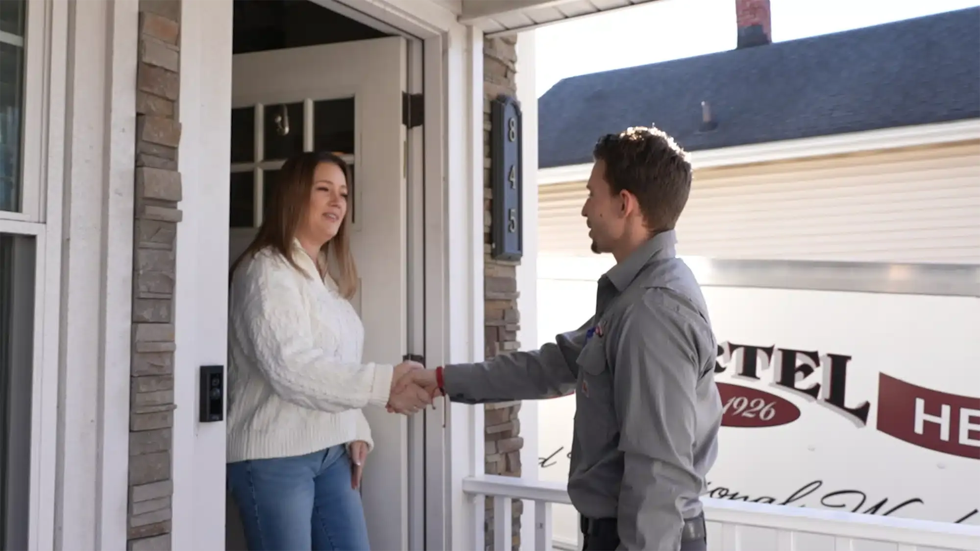 Martel specialist shaking customers hand